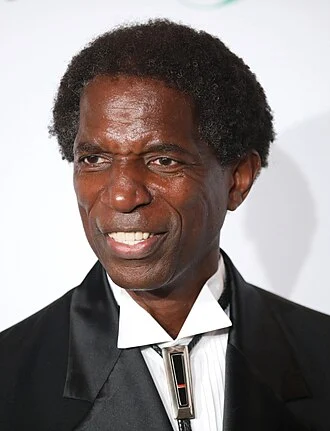 A. C. Green height profile photo