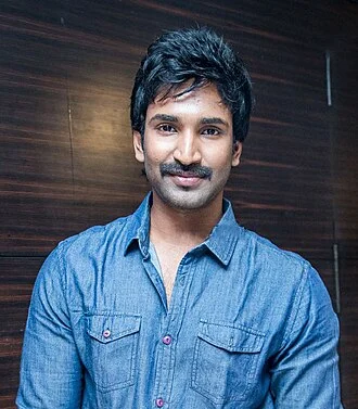 Aadhi Pinisetty height profile photo