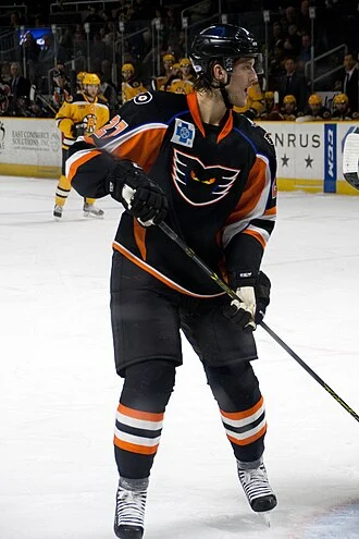 Adam Comrie height profile photo