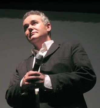 Adam Curtis height profile photo