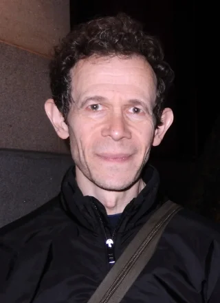 Adam Godley height profile photo
