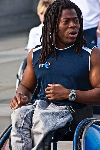 Ade Adepitan height profile photo
