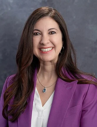 Adriana Kugler height profile photo