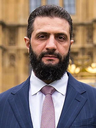 Ahmed al-Sharaa height profile photo