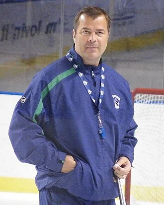 Alain Vigneault height profile photo