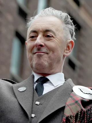 Alan Cumming height profile photo