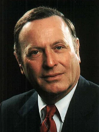 Alan J. Dixon height profile photo