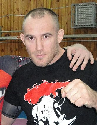 Aleksei Oleinik height profile photo