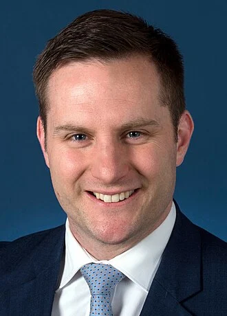 Alex Hawke height profile photo