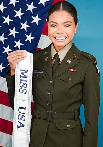 Alma Cooper height profile photo