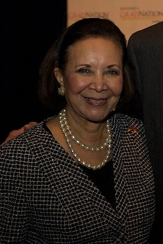 Alma Powell height profile photo