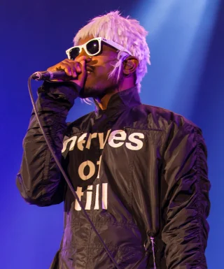 André 3000 height profile photo