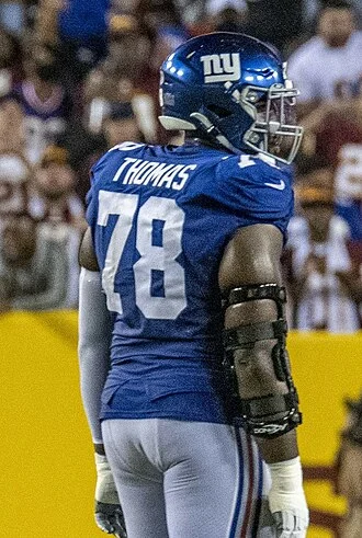 Andrew Thomas (American football) height profile photo