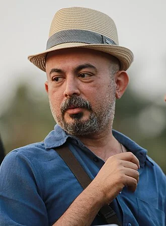 Anil Radhakrishnan Menon height profile photo