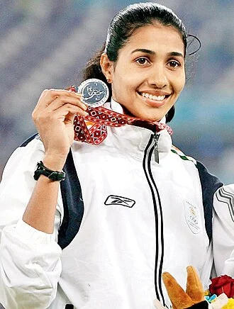Anju Bobby George height profile photo