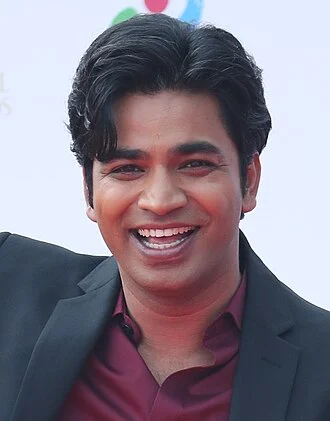 Anupam Tripathi height profile photo