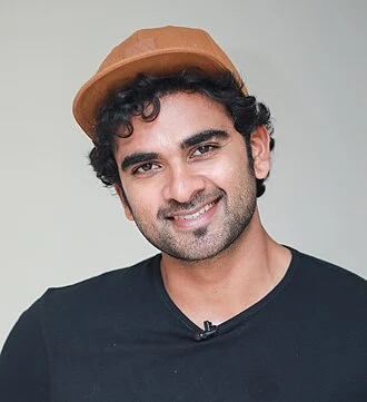 Ashok Selvan height profile photo