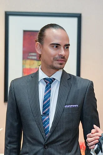 Ashraf Sinclair height profile photo