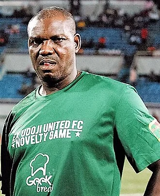 Augustine Eguavoen height profile photo