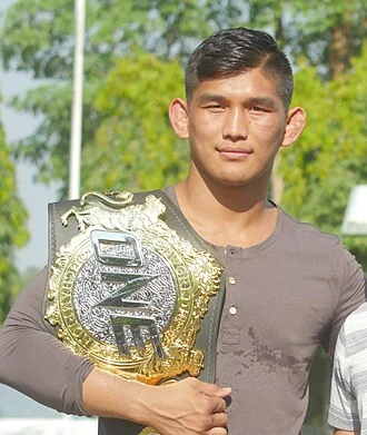 Aung La Nsang height profile photo
