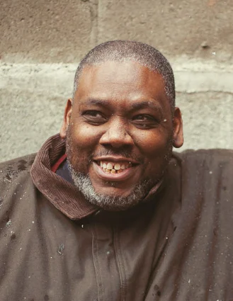 Azie Faison height profile photo