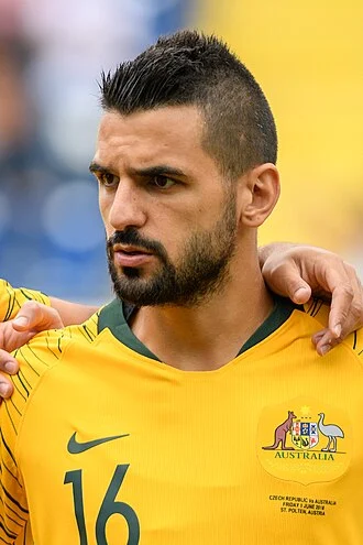 Aziz Behich height profile photo