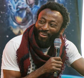 Babs Olusanmokun height profile photo