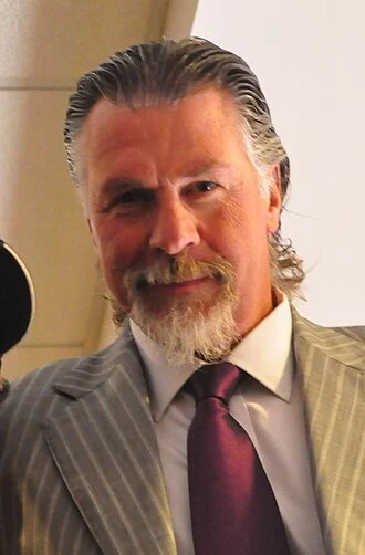 Barry Melrose height profile photo