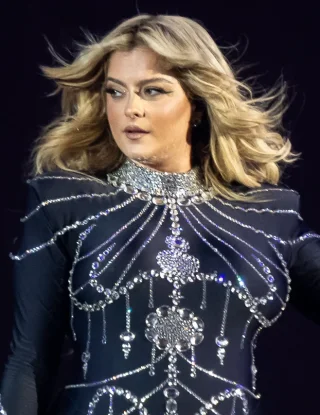 Bebe Rexha height profile photo
