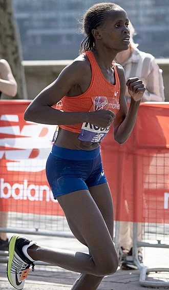 Brigid Kosgei height profile photo