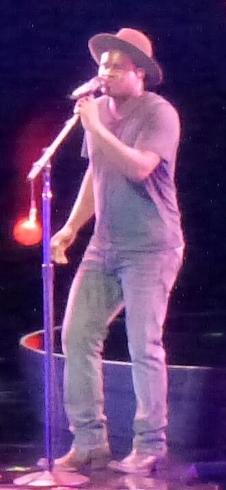 C. J. Harris (singer) height profile photo