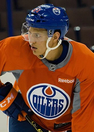 Caleb Jones (ice hockey) height profile photo