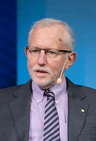 Charles M. Rice height profile photo