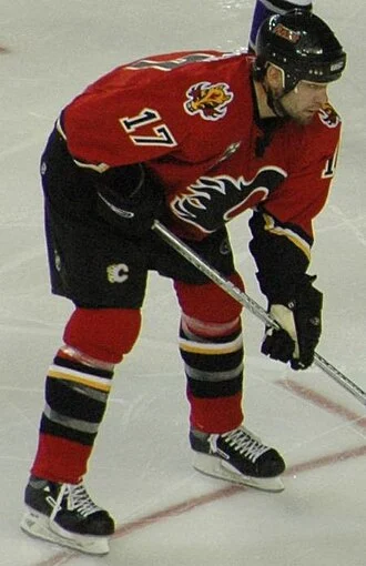Chris Simon height profile photo