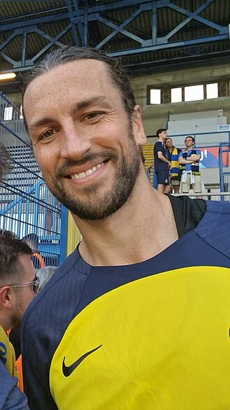 Christian Burgess height profile photo