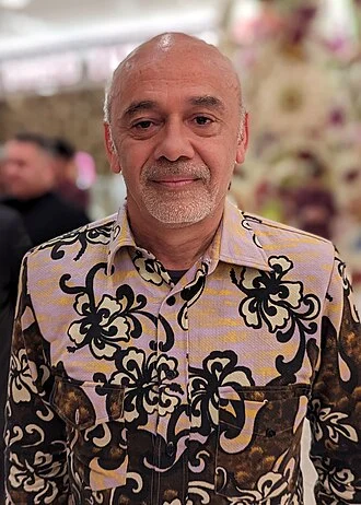 Christian Louboutin height profile photo