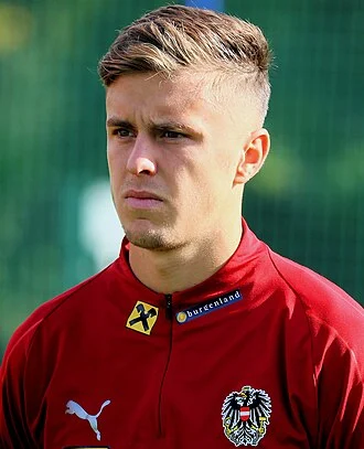 Christoph Baumgartner height profile photo