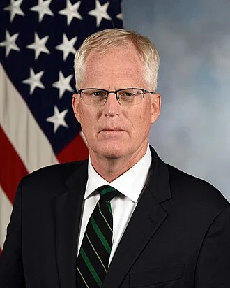 Christopher C. Miller height profile photo