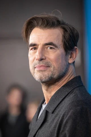 Claes Bang height profile photo
