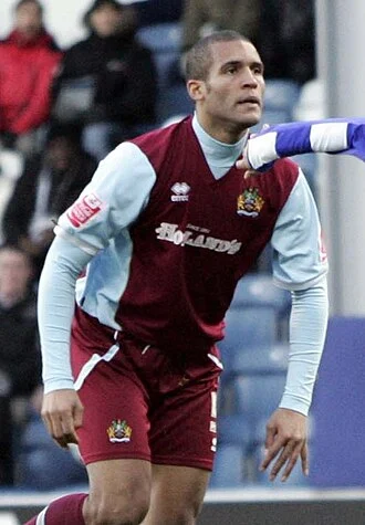 Clarke Carlisle height profile photo