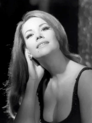 Claudine Auger height profile photo