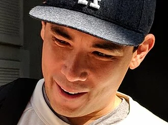 Conrad Ricamora height profile photo