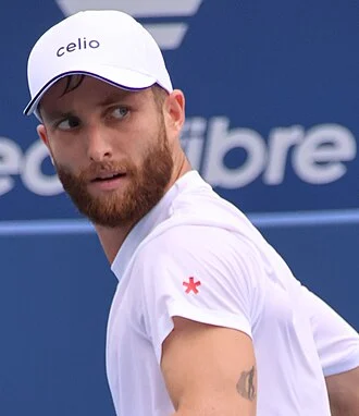 Corentin Moutet height profile photo