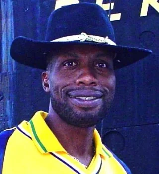 Curtly Ambrose height profile photo
