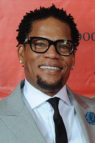 D. L. Hughley height profile photo