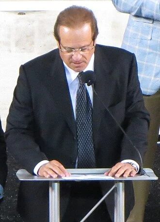 Dean Spanos height profile photo
