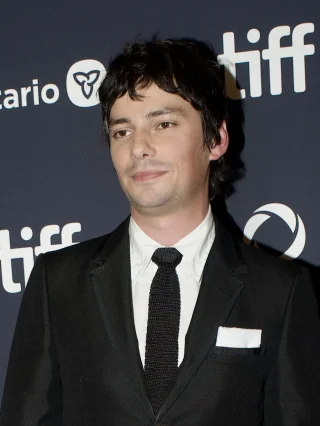 Devon Bostick height profile photo