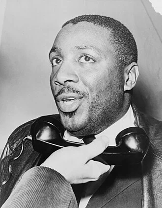 Dick Gregory height profile photo