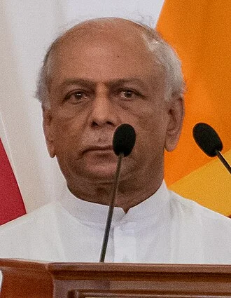 Dinesh Gunawardena height profile photo