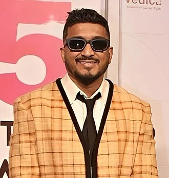 Divine (rapper) height profile photo